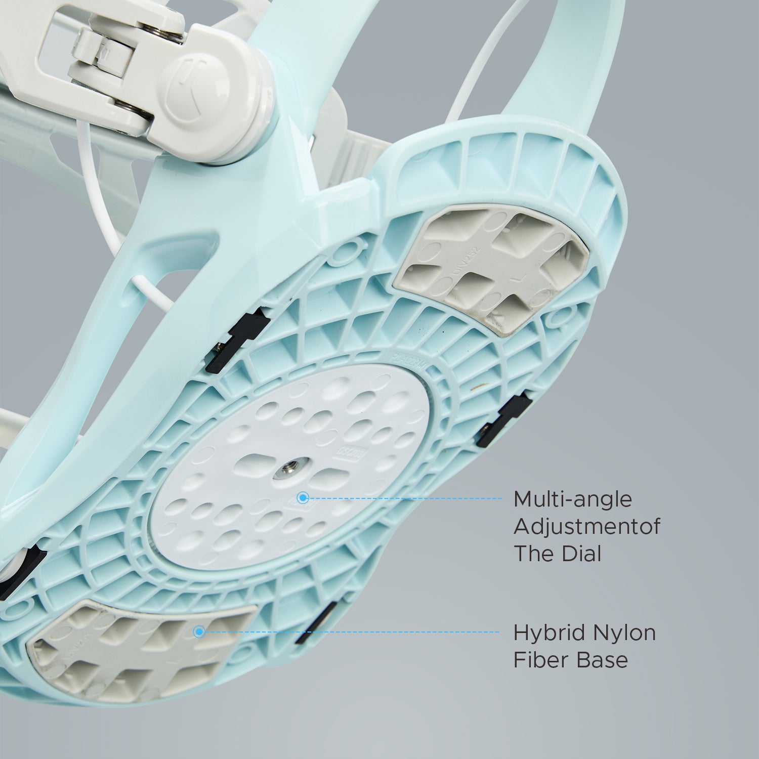Bottom baseplate view of XCMAN 360 Seco white and blue snowboard bindings showing the hybrid nylon fiber base and multi-angle adjustment dial
