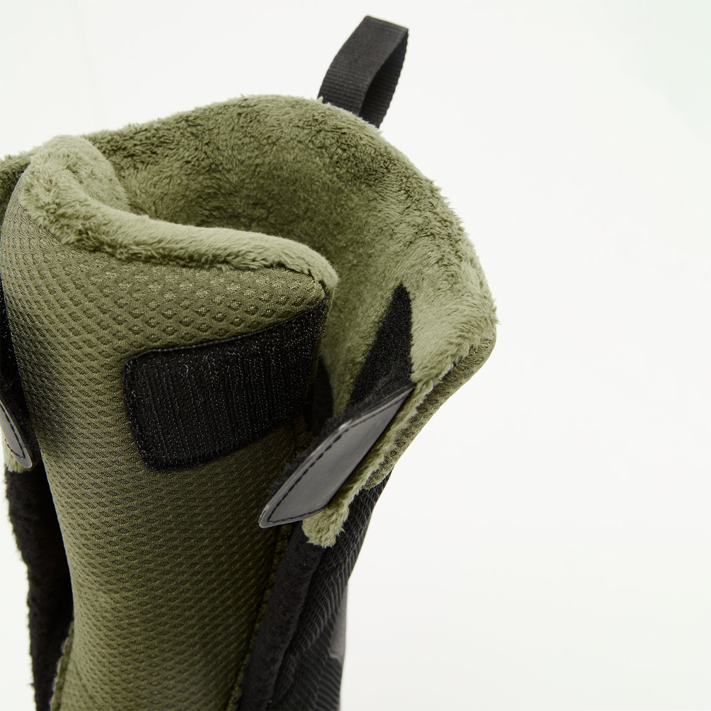 Detailed view of the internal harness, tongue, and secure strap system inside XCMAN NOX-I boots