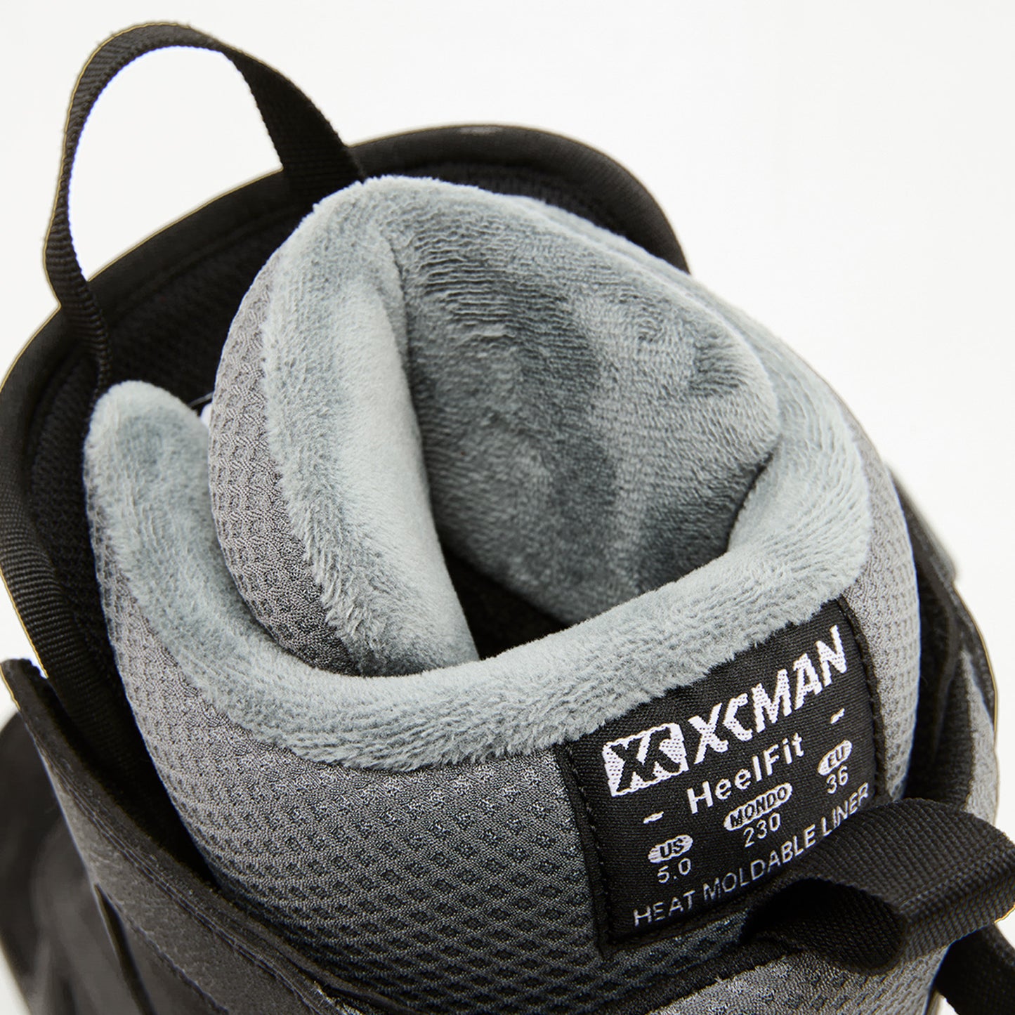 Close-up of the upper cuff and plush fleece liner opening with HeelFit technology on XCMAN NOX-II snowboard boots